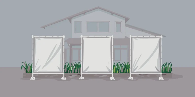 Custom graduation yard signs celebrating a graduate in a front lawn.