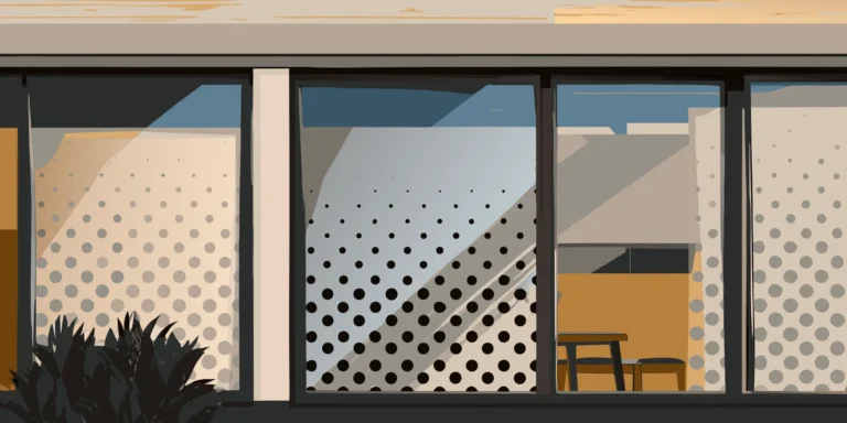 Perforated window signs on a storefront creating privacy with one-way vision.