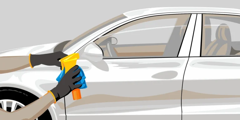 Cleaning a car door with a spray and cloth before applying a vinyl decal.