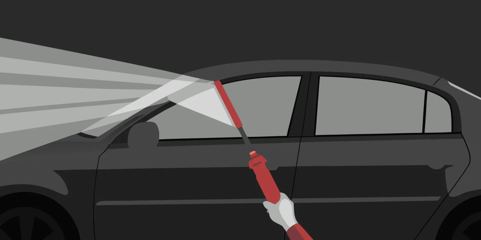 Cleaning a car window before applying window decals for cars.